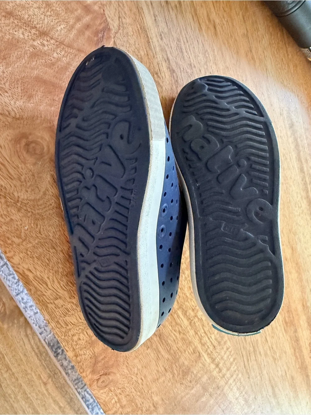 Native Kids Navy Slip-On Water Shoes with White Toe Caps on